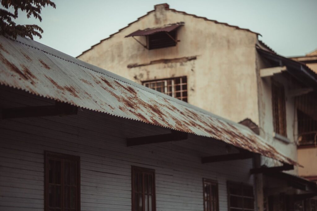 Rusted corrugated roof on an old timber building